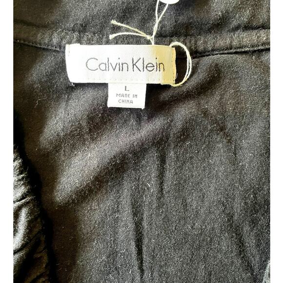 CALVIN KLEIN, SIZE L, BLACK PEPLUM TOP, V NECK, CAP SLEEVE - Picture 4 of 4